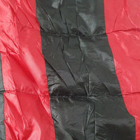 Close up of Allgoods Bush Hut Trek Lite Sleeping Bag in Black/Red