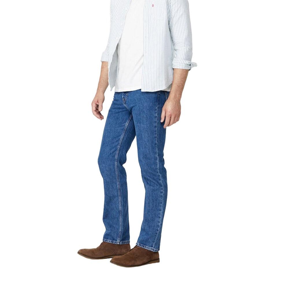 Side view of model wearing Levi's 516 Men's Straight Fit Jean in Stonewash
