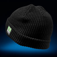 A black FXD CP-10 knit ribbed beanie with a turn-up cuff and a branded woven label on the side.