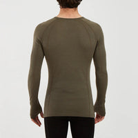 Back of model wearing XTM Mens Merino Top in Kalamata