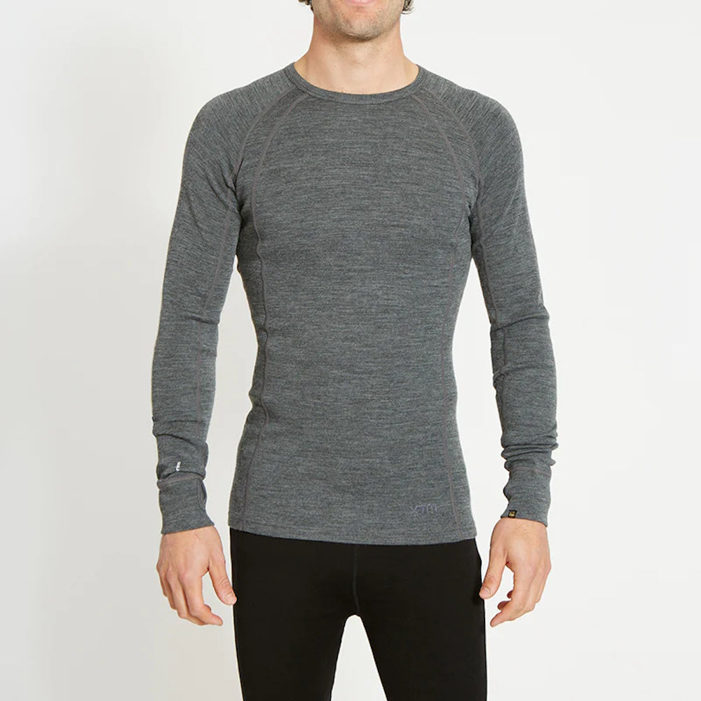 Front of model wearing XTM Mens Merino Top in Mid Grey