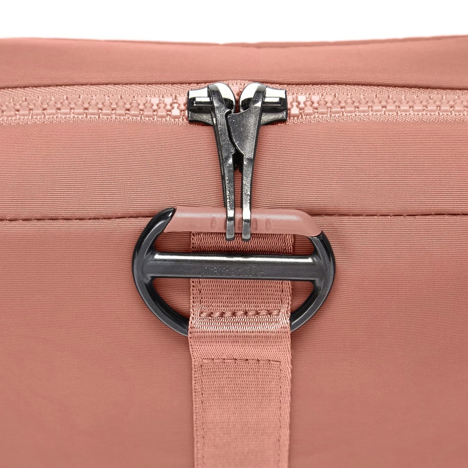 Close up of zipper on Rose Pacsafe Citysafe CX Square Crossbody Bag