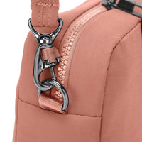 Close up of clip on Rose Pacsafe Citysafe CX Square Crossbody Bag