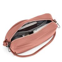 Top down view of opened Pacsafe Citysafe CX Square Crossbody Bag Rose