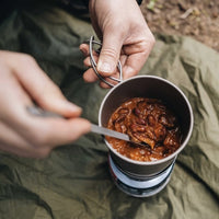 Alton Goods Single Wall Titanium Cup full of baked beans