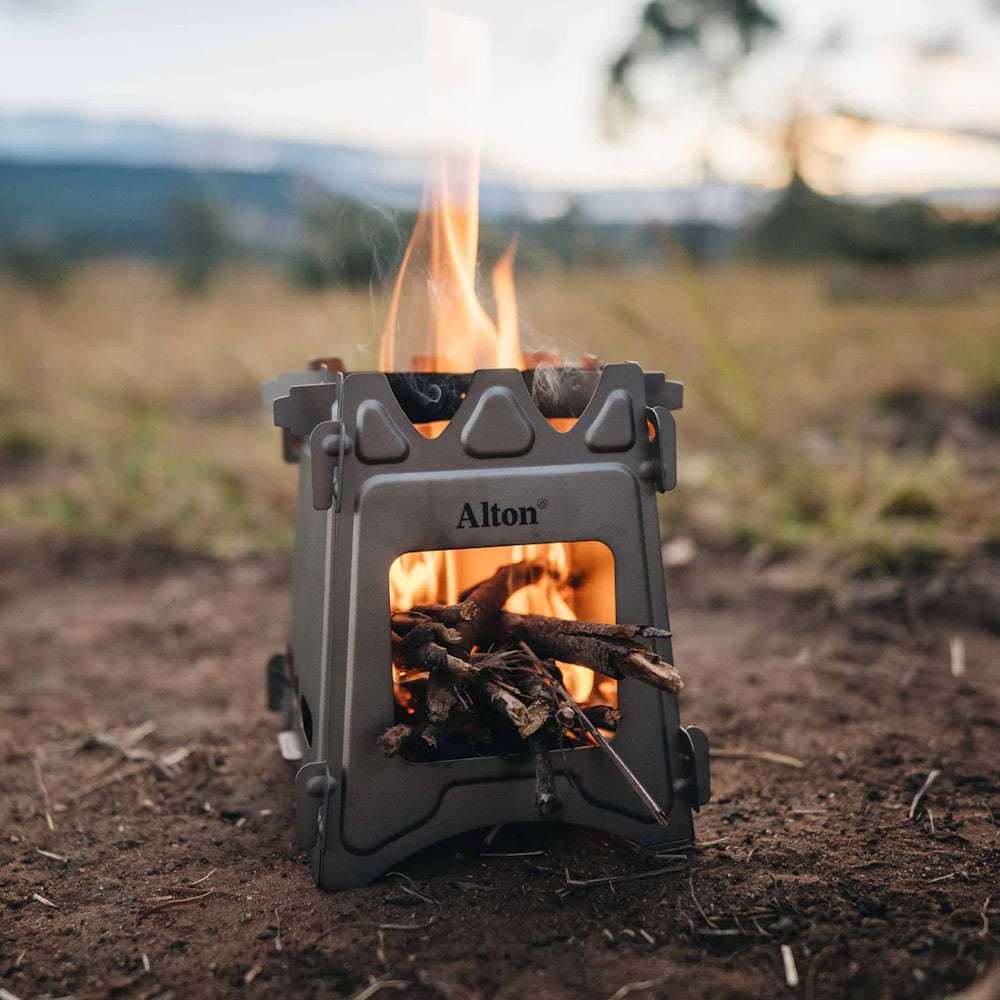 Fire inside of Alton Goods Titanium Flatpack Twig Stove