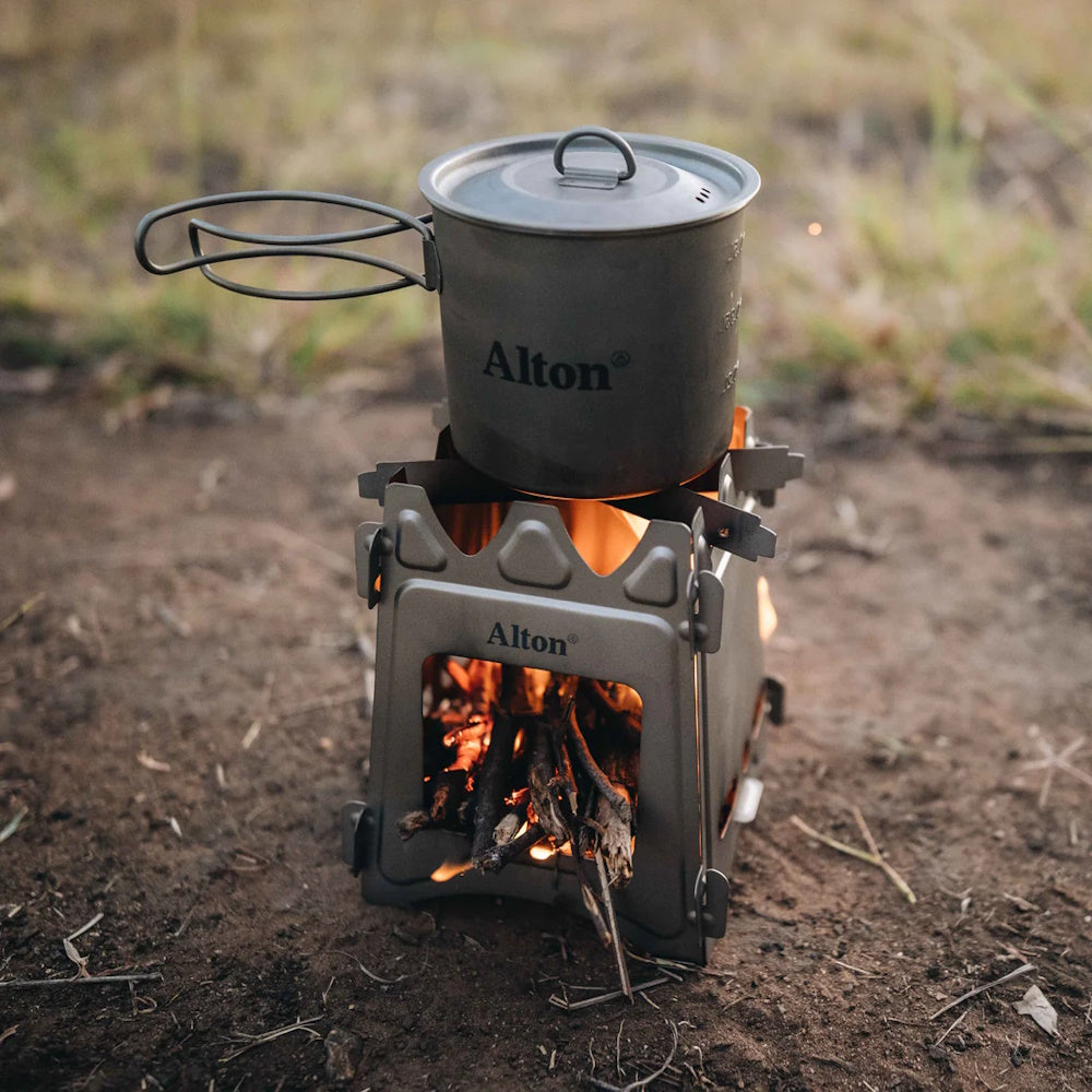 Billy atop of Alton Goods Titanium Flatpack Twig Stove