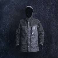 Desolve Fathom Jacket in heavy rain