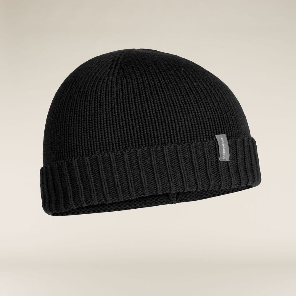 A black Icebreaker Merino Vela Cuff Beanie made of merino wool and cotton