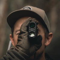 Man looking out of Ridgeline Performance 1500 Rangefinder