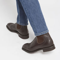 R.M.Williams Dynamic Flex Craftsman Boots in Chestnut being worn with blue jeans