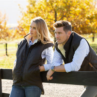 Male & Female model wearing Styx Mill Oilskin Shearling Lined Vest outdoors