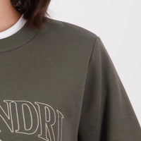 Close up of shoulder on dark olive/horizon grey Swanndri Womens Ivy Embroidered Crew