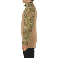 Side view of male model wearing 5.11 Rapid Assault Shirt in Multicam with Black pants.