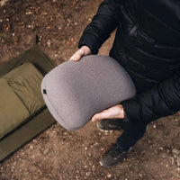 Man holding Alton Goods Ultralight Pillow