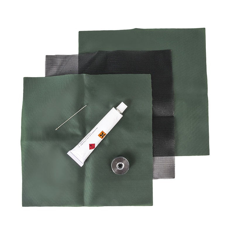 Each item in the Elemental Nylon Repair Kit spread out. This includes: Mesh patch, x2 green square patches, tube of fabric glue, sewing needle and a roll of thread.