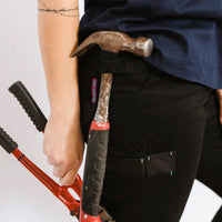 Close up of hammer attached to Black Green Hip Womens SKNY Flex Pants