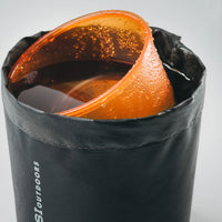Plastic mug in water