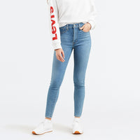Front view of model wearing Levi's Women's Mile High Super Skinny Jean in Math Club