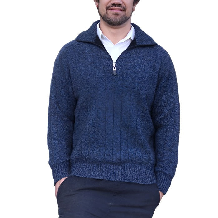 Male model wearing a Lothlorian zip collar rib jumper in Blue Marle, with Blue jeans.