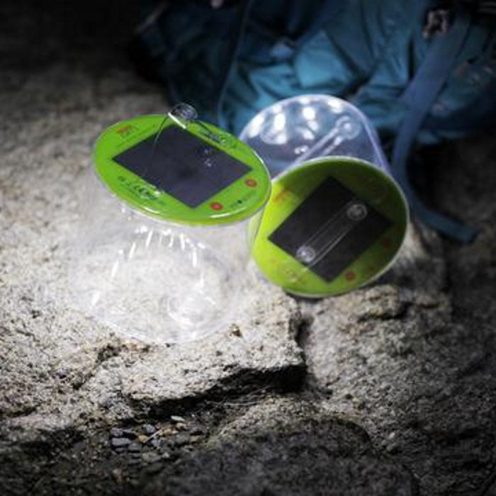 Luci Outdoor 2.0 Solar Lantern on rocks