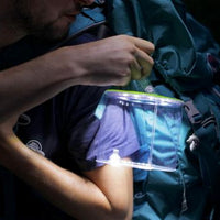 Luci Outdoor 2.0 Solar Lantern attached to rucksack