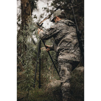 Man setting up Ridgeline Speed Stick Tripod