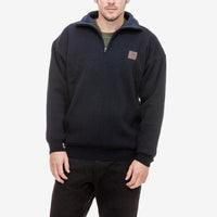 Front view of model wearing Swanndri Rhino Stormshield Wool Jumper in Navy