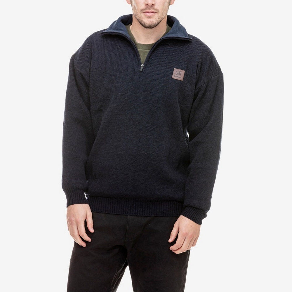 Front view of model wearing Swanndri Rhino Stormshield Wool Jumper in Navy