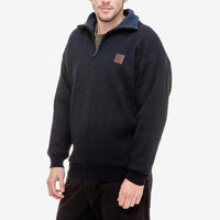 Side view of model wearing Swanndri Rhino Stormshield Wool Jumper in Navy