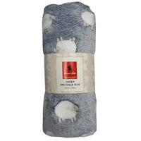 Thomas Cook Sheep Snuggle Rug Rolled Up