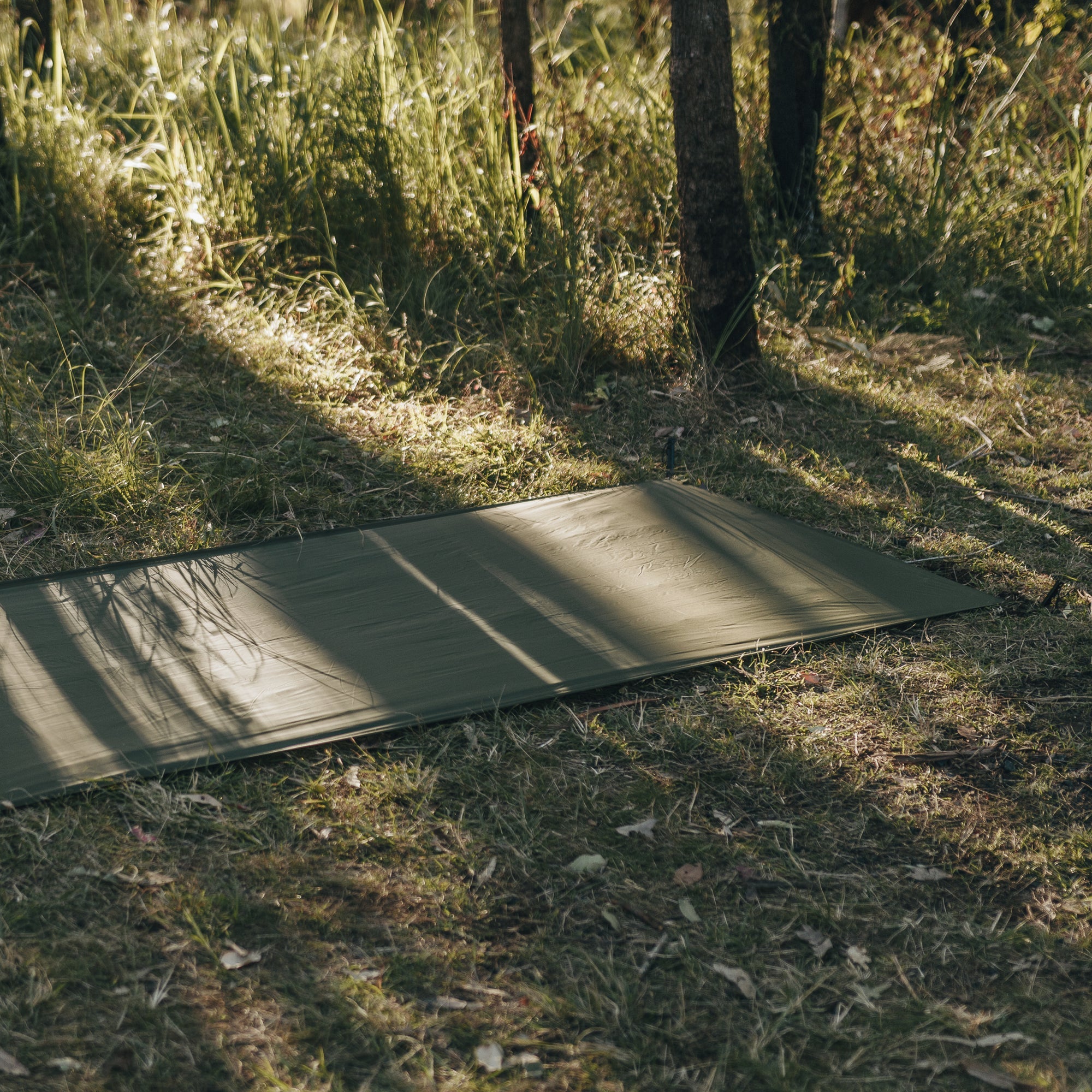 Close up of Alton Goods Ultralight Groundsheet flat on ground