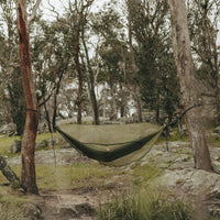 Alton Goods Ultralight Hammock Bug Net attached between two trees