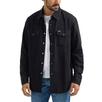 Man wearing a black Wrangler denim shirt over a white t-shirt