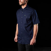 Model wearing Navy FXD SSH-1 Men's Short Sleeve Stretch Work Shirt