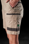 Side view of hand in pocket of khaki FXD WS-3W Women's Stretch Work Shorts