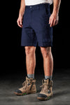 Model wearing Navy FXD WS-3 Men's Stretch Work Shorts