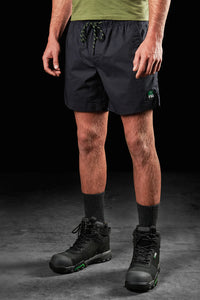 Model wearing FXD WS-4 Men's Repreve Stretch Ripstop Work Shorts in Black