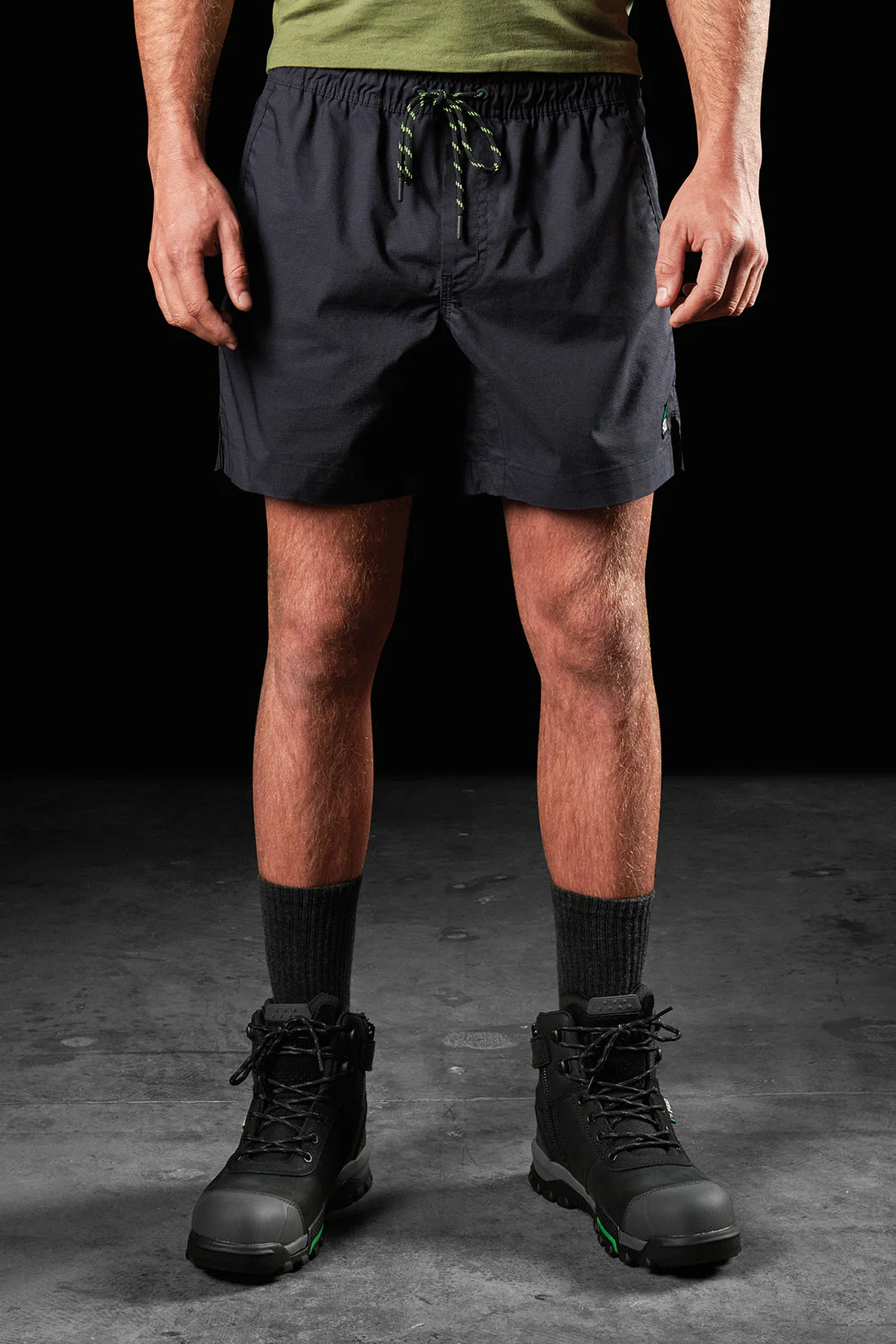 Front of model wearing FXD WS-4 Men's Repreve Stretch Ripstop Work Shorts in Black