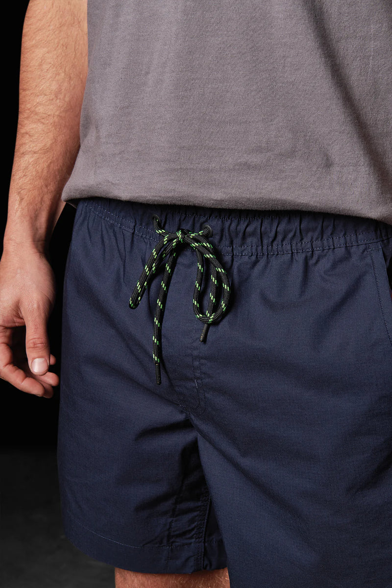 Close up of drawstring cord on Navy FXD WS-4 Men's Repreve Stretch Ripstop Work Shorts