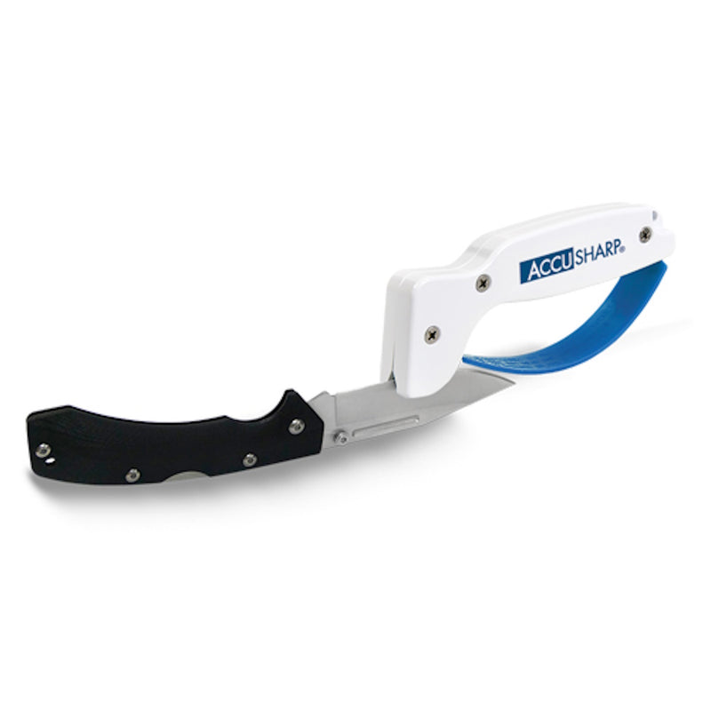 Accusharp Knife Sharpener being used on pocket knife