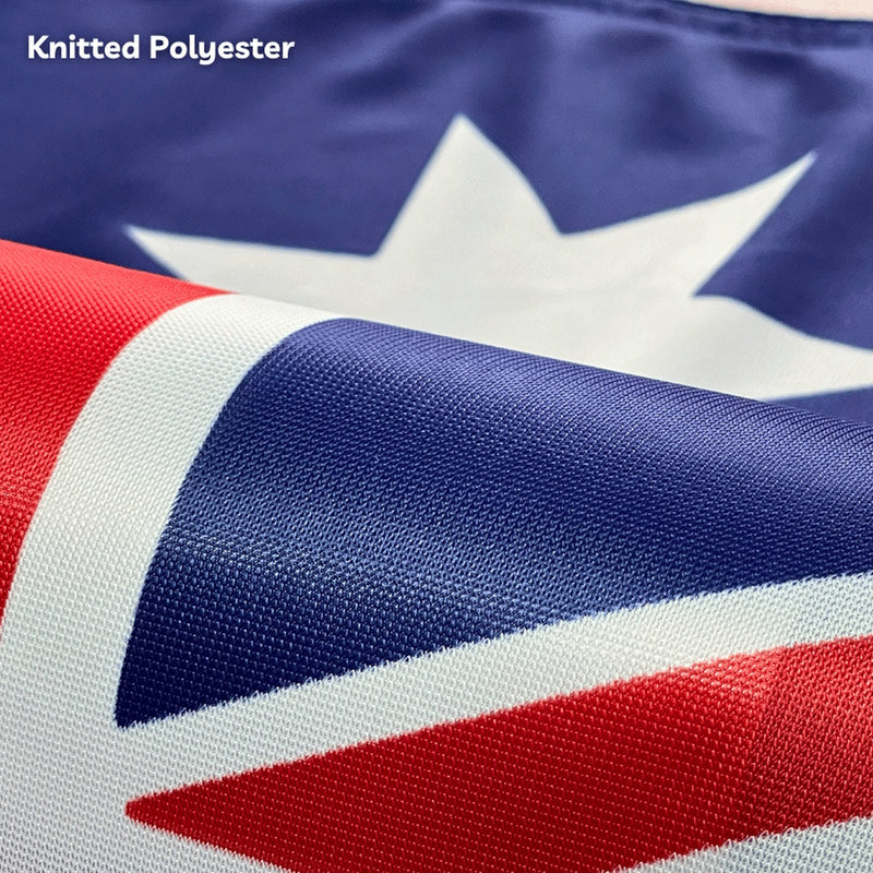 Close-up of a knitted polyester fabric with red, white, and blue colors.