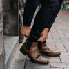 Man pulling on Blundstone 1900 Dress Ankle Boot
