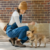 Woman petting dog while wearing Blundstone 585 Urban Boots