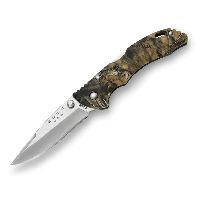 Buck camouflage folding knife on a white background