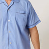Close up of Light blue Contare Cotton Rich shirt with black piping.