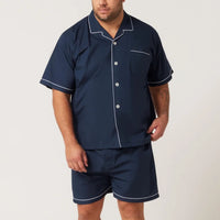 Man wearing a navy Contare pyjama set