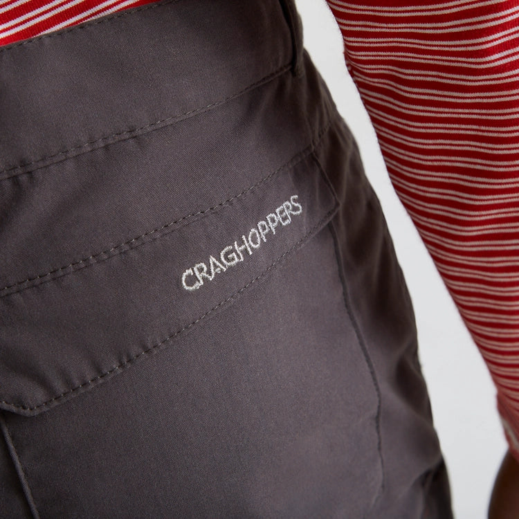 Close up of back pocket on Craghoppers Kids Kiwi II Trousers