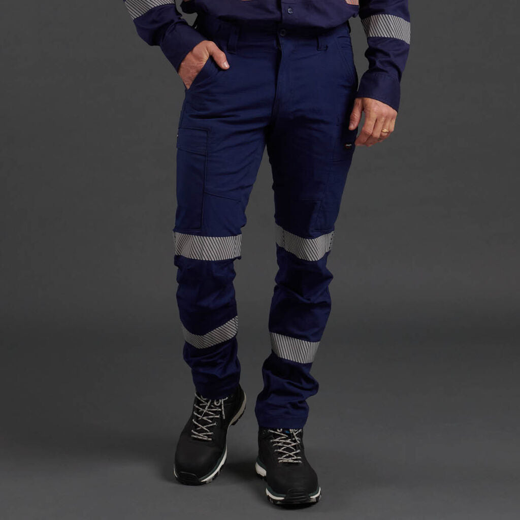 Front view of model wearing KingGee Workcool Pro Reflective BioMotion Work Pants in Navy