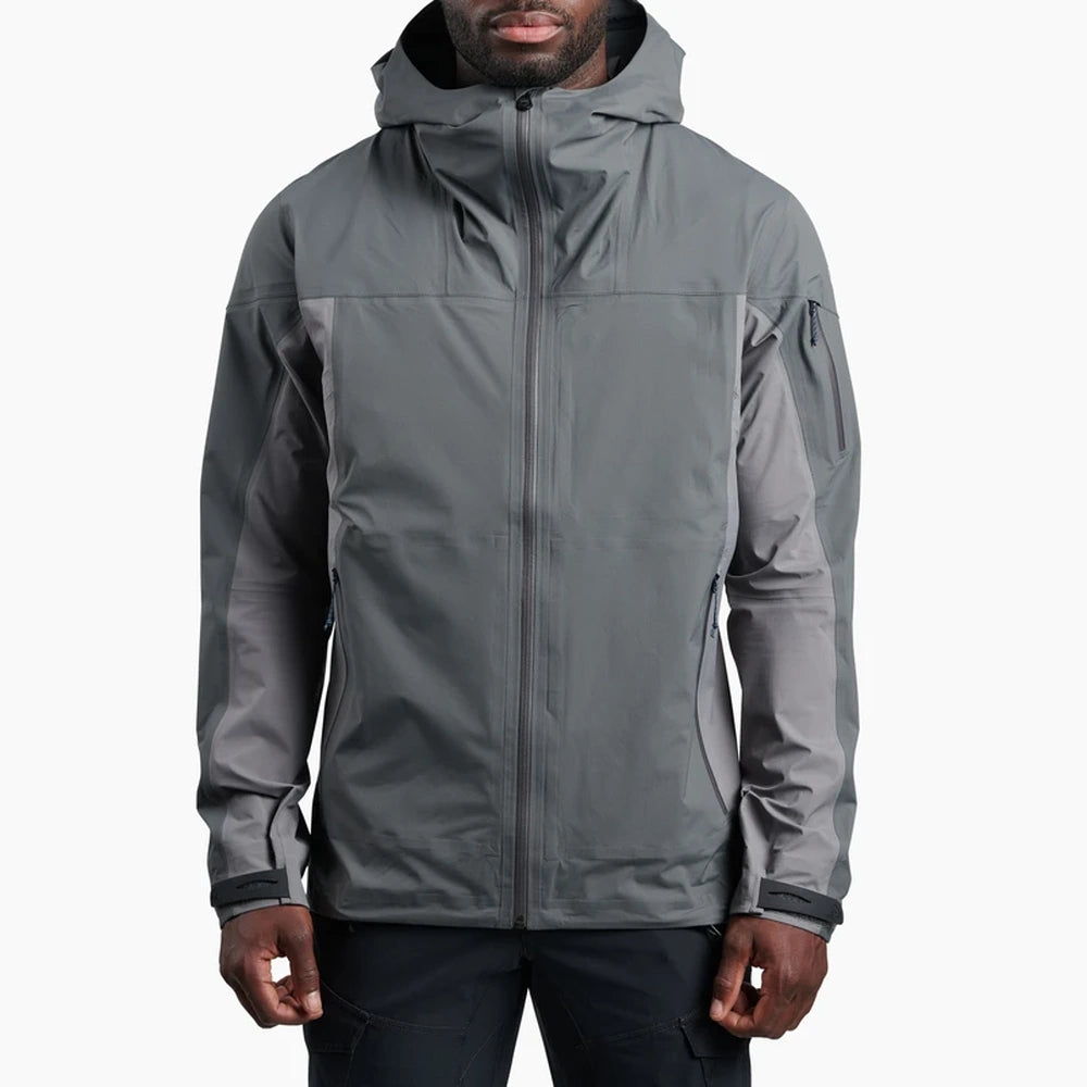 Man wearing Kuhl The One Rain Jacket in Carbon